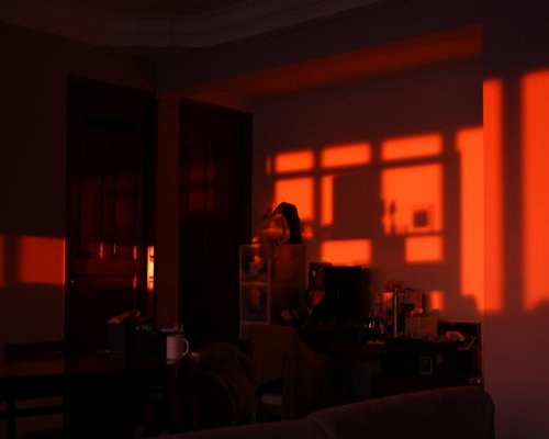Relaxing at home in the evening, dim lighting